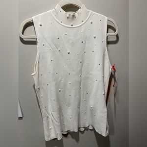 Ruby Rd. brand white sleeveless turtle neck sweater with beautiful pearl beads.